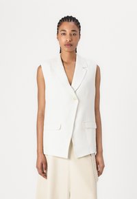 Длинный жилет Длинный жилет