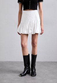 Мини-юбка Мини-юбка