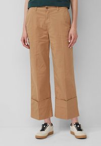 Широкие брюки Широкие брюки