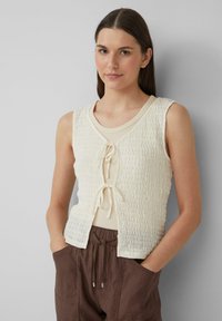 Жилет Жилет