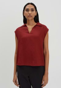 Блузка без рукавов Блузка без рукавов