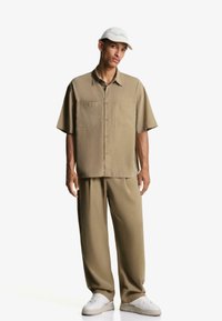 Брюки Брюки