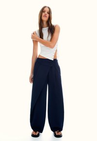 Широкие брюки Широкие брюки