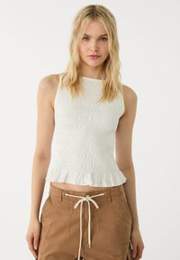 Блузка без рукавов Блузка без рукавов