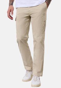 Брюки с накладными карманами Брюки с накладными карманами