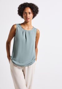 Блузка без рукавов Блузка без рукавов