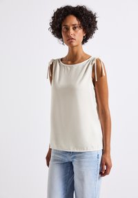 Блузка без рукавов Блузка без рукавов