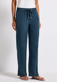 Широкие брюки Широкие брюки