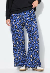 Широкие брюки Широкие брюки