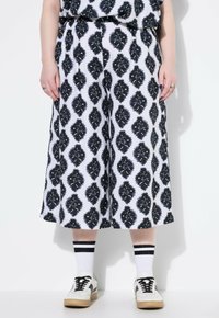 Широкие брюки Широкие брюки