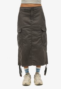 Юбка с накладными карманами Юбка с накладными карманами