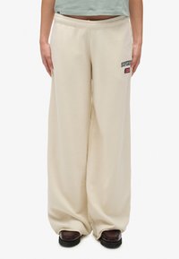 Широкие брюки Широкие брюки