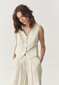 Жилет Жилет