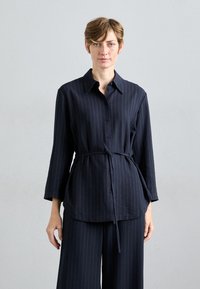 Блузка-рубашка Блузка-рубашка