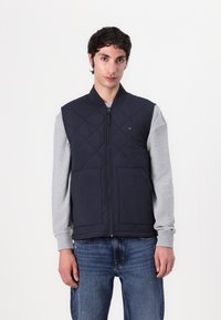 Жилет Жилет