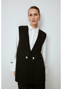 Длинный жилет Длинный жилет