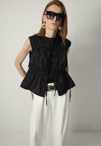 Жилет Жилет