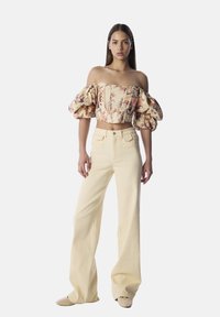 Широкие брюки Широкие брюки