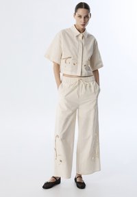 Широкие брюки Широкие брюки