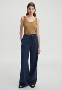 Широкие брюки Широкие брюки