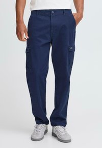 Брюки с накладными карманами Брюки с накладными карманами