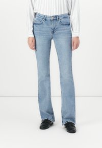 Клешеные брюки Клешеные брюки