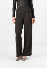 Широкие брюки Широкие брюки