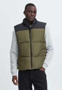 Жилет Жилет