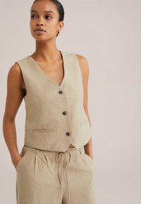 Джинсовая жилетка Джинсовая жилетка