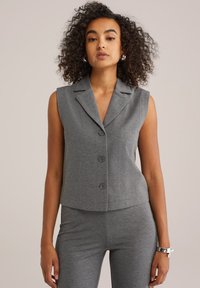 Жилет Жилет