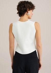 Жилет Жилет