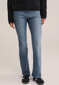 Клешеные брюки Клешеные брюки