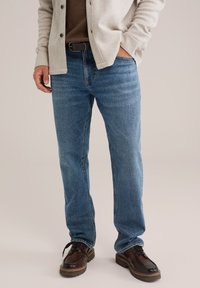 Узкие джинсы Узкие джинсы