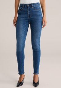 Узкие джинсы Узкие джинсы