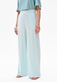 Широкие брюки Широкие брюки