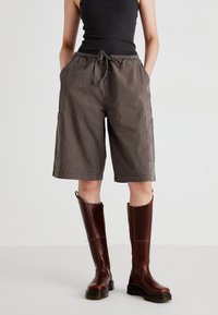 Юбка с накладными карманами Юбка с накладными карманами