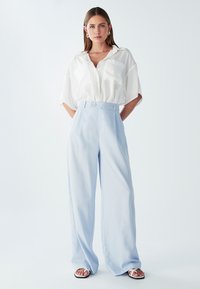 Брюки Брюки