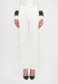 Джинсы бойфренда Джинсы бойфренда