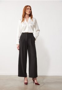 Туфли на высоком каблуке Туфли на высоком каблуке