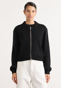 Жилет Жилет