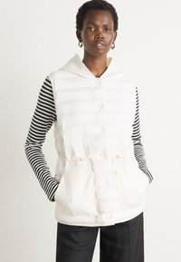 Жилет Жилет