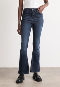 Клешеные брюки Клешеные брюки