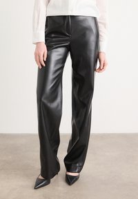 Широкие брюки Широкие брюки