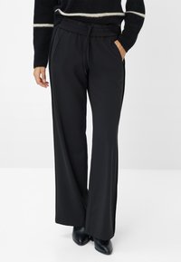 Широкие брюки Широкие брюки