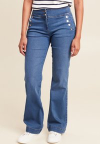 Клешеные брюки Клешеные брюки