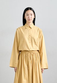 Блузка-рубашка Блузка-рубашка