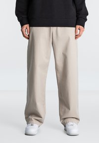 Широкие брюки Широкие брюки