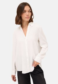 Длинная блузка Длинная блузка