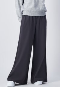 Широкие брюки Широкие брюки