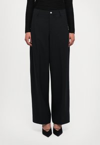 Широкие брюки Широкие брюки